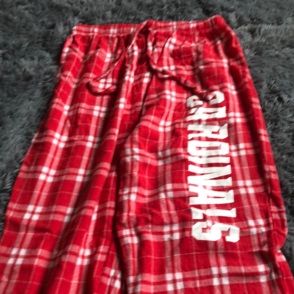 Thin pair of pajama/sweatpants cardinal label on sweatpants